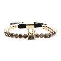 Detailed view of woven crown bracelet with blue cubic zirconia and gold beads - Blue Zirconia Gold Crown Bracelet
