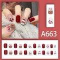 Detailed view of Christmas themed press-on nails set with Santa and reindeer designs - A663 Red White Grid Santa