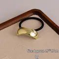 Minimalist gold metallic arc elastic hair tie with polished mirror finish surface - Narrow Surface Gold