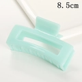 Detail showing 8.5cm mint green rectangular hollow hair claw clip on white plate - Mint Green (S150-19) / 8.5cm