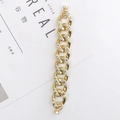 Gouden dikke ketting polsband met witte strassteentjes voor telefoon op tijdschrift - Met Diamanten Bezette Armband / Goud