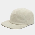 Detail view of off-white faux suede 5-panel camper hat with metal eyelets and flat brim - Adjustable / Beige