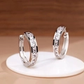 Elegant silver hoops with square-cut white zircons on a white display stand - Square Row Rhinestone Style (3625)
