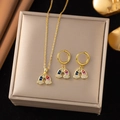 Set gioielli arcobaleno con collana dorata e orecchini su scatola beige - Oro