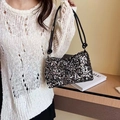 Borsa baguette con paillettes nere e argento con tracolla in corda intrecciata - Taglia unica / Argento