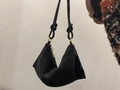 Detail of hand-woven black beaded hobo bag with knotted strap and gold-tone zipper - Standard Size / Black Zirconia