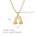 Macro view of stainless steel cloud rainbow necklace pendant with white shell inlay - Gold