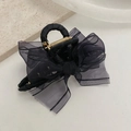 Pince à cheveux élégante avec nœud en tulle noir et ressort doré pour un look chic - Noir Étoilé