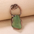 Vintage green fluorite crystal pendant with antique bronze wire wrap detailing - Green Fluorite