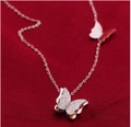 Silver butterfly pendant necklace with frosted finish and delicate chain for women - Necklace / Steel