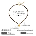 Detail of 18K gold crab pendant with dimensions on beaded stainless steel necklace - Brown Beaded Round Pendant Necklace(JDN0304046)