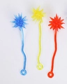 Three colorful sea urchin catapult toys in blue yellow and red with ring base - Meteor Hammer