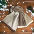 Minimalist tri-color knit scarf in beige and brown tones on a winter wooden setting - Coffee