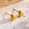 Minimalist 18K gold heart stud earrings featuring a high-polish metallic finish - Heart Stud Earrings / Gold