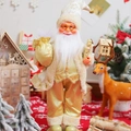 Close-up detail of 12-inch standing Santa Claus doll in festive gold and cream outfit - Gold Gift Bag Style / 45cm