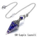 Close-up of lapis lazuli crystal chips inside a hexagonal dowsing pendulum with silver chain - Lapis Lazuli Ancient Silver