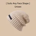 Oatmeal thick knit beanie with cuffed brim and black woven label for winter warmth - One Size / Long Label Style / Beige