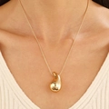 Polished gold teardrop pendant necklace for women in minimalist punk style - Gold Teardrop Necklace