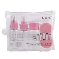Portable travel bottle set with pink caps in a transparent PVC zipper bag on white background - 7-Piece Set / Pink