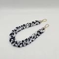 Detail of acrylic resin chain with black and white marble pattern and gold lobster clasps - Acetate Ink Blue