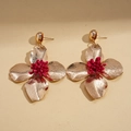 Detail of vintage gold flower earrings with red centers and textured metal petals - Flower Shape Silver Pin Earrings / Red
