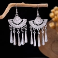 Silver bohemian fan-shaped tassel earrings featuring hollow carvings and metal cones - Silver Fan Cone Tassel(E5774-1)
