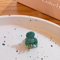 Mini marble dark green cellulose acetate hair claw clip with gold France lettering - Emerald Glaze