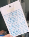 Detailed view of blue cursive letter nail stickers WG720 in 3D design packaging - Blue (WG720)