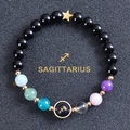 Detailed macro view of Sagittarius beaded bracelet with colorful natural stones and star charm - Sagittarius-Obsidian