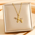 Collana con cane palloncino dorato e orecchie in zircone su scatola di gioielli di lusso - Cane palloncino dorato