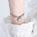 Zilveren kralenarmband met hartvormige boze oog hanger en micro-pave details op ketting - E449-Stalen kleur armband