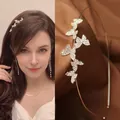 Elegante cerchietto dorato con cinque farfalle scintillanti di strass per capelli donna - Giardino Delle Farfalle Dorate