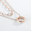 Double layer rose gold titanium necklace featuring interlocking triple rings - Rose Gold (KN117737-K)