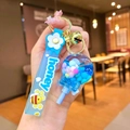 Blue lollipop keychain with oil-filled liquid ball, bell, and honey printed strap - Blue Luminous Color Bean Lollipop