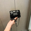 Small black quilted handbag with silver chain strap and metal clasp in high-quality PU leather - Black Small