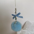 Detail of blue plush pompom charm with silk bow and hollow star metal pendant - Blue