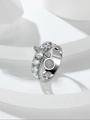 Macro view of silver ring featuring a round disc pendant set with sparkling zircon stones - US 4 / Silver