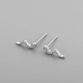 Macro shot of S925 sterling silver snake-shaped earrings with sparkling cubic zirconia - Platinum (Wave Style)