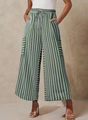Close-up of green and white striped wide-leg trousers with drawstring elastic waist - S / Bottoms / Light Green