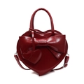 Sac à main coeur rouge brillant avec grand nœud décoratif et poignée supérieure - Bordeaux