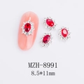 Dettaglio di ciondolo per unghie ovale in cristallo rosso con strass su unghia rosa - Stile Ovale Rosso (8991)