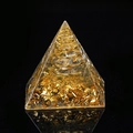 Orgone pyramid with natural crystal gravel, golden foil, and copper coil for desk decor - Clear Quartz