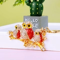 Golden owl keychain with crystal rhinestones and red enamel owl details on branch - A430 Owl S Red