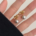 Golden knot earrings with grey pearls and 925 silver needles for a trendy look - Gold Knot Shape with Gray Pearl (A61)