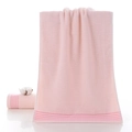 Thick light pink cotton towel with dark pink stripes and a natural cotton ball - Soft Pink