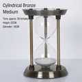 Medium size cylindrical hourglass with bronze metal frame and 30-minute white sand timer - Cylindrical Three-Column Medium - 30 Minutes