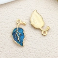 Golden leaf charms with blue enamel inlay and hanging loops for jewelry making - 1pc Blue Leaf