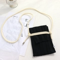 Detailed view of black pleated knitted phone bag with beige adjustable shoulder strap - One Size / Black Bag + Cream Rope