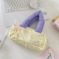 Sac à main matelassé bicolore avec poignées lavande rembourrées et ruban rose - Beige