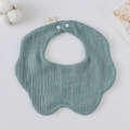 Petal-shaped 100% cotton gauze baby bib in muted dusty blue with a snap closure - Gauze Flower Scarf - Denim Blue